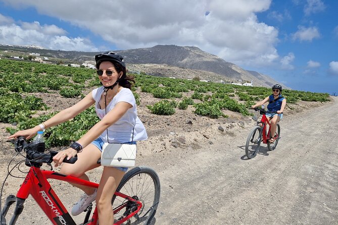 Santorini e-bike sunset tour experience - Santorini’s low basket vineyards