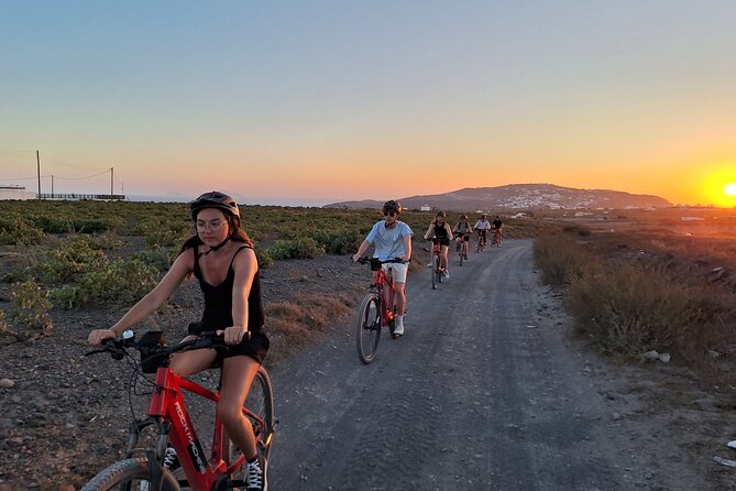 Santorini e-bike sunset tour experience - Megalochori as the sunset stage