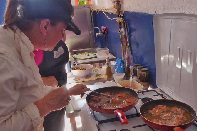 Santorini Family Farm Food & Wine Tour with Cooking Class - The family farm and tomato processing space