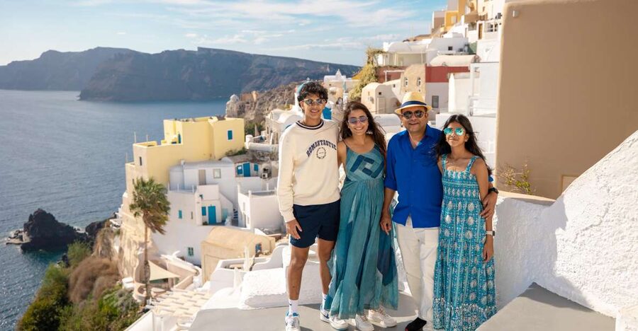 Santorini Family Photoshoot (Oia Village) - Blue domes, private viewpoints, and the Oia setting