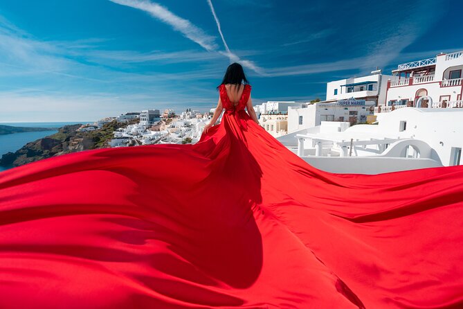 Santorini flying dress photo - The dress rental changes the real price