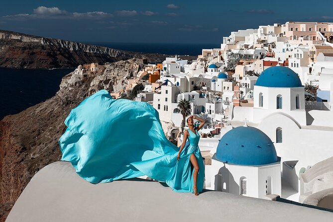 Santorini flying dress photo - Oia or Imerovigli: choosing your backdrop