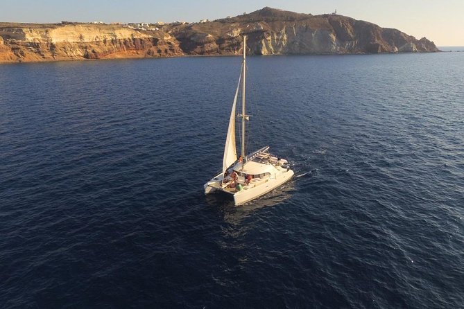 Santorini Full Day Catamaran Private Cruise incl. Meal, Drinks & Free Transport - Mesa Pigadia and the return toward Vlychada
