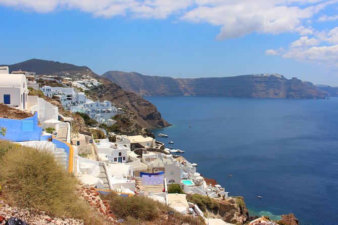 Santorini Full Day Tour - Oia sunset is a dramatic final act