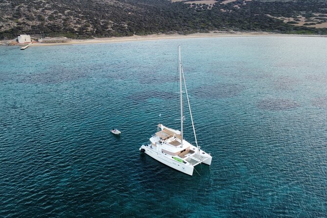 Santorini Gold Catamaran Cruise with BBQ, Drinks and Hotel Pickup - What the crew adds to the day