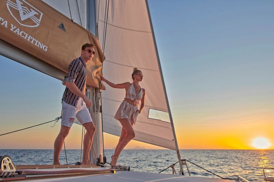 Santorini Gold Catamaran Cruise with Snorkel, BBQ & Open Bar - White Beach and the Venetian lighthouse
