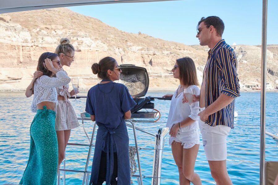 Santorini Gold Catamaran Cruise with Snorkel, BBQ & Open Bar - The crew makes the five hours feel easy