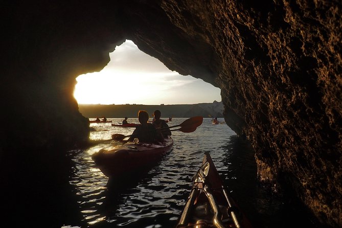 Santorini Guided Sea Kayaking with Light Lunch and Pick-up Option - Red Beach and the sea cave