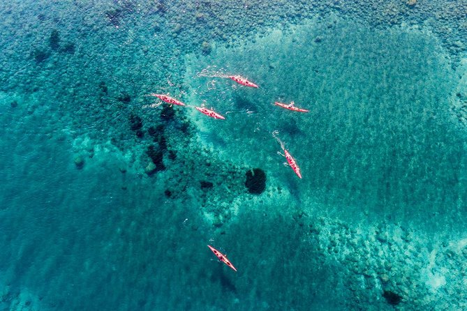 Santorini Guided Sea Kayaking with Light Lunch and Pick-up Option - Pickup, timing, and what to pack