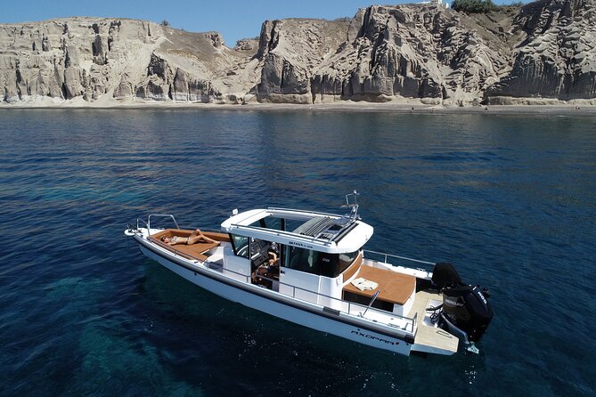 Santorini Half Day MotorCruiser Private Cruise incl. Meal,Drinks &Free Transport - Aspronisi and the volcanic story