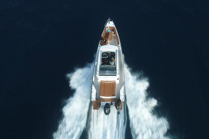 Santorini Half Day MotorCruiser Private Cruise incl. Meal,Drinks &Free Transport - Oia, Imerovigli, and Firostefani from below
