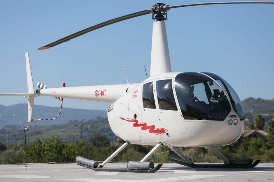 Santorini: Helicopter Sightseeing Flight Over Caldera - Vineyards, dry hills, and the Aegean
