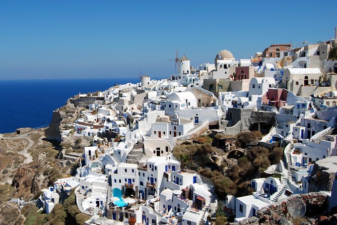 Santorini Highlights and Venetian Castles Small-Group Day Tour - Starting late with pickup across the island
