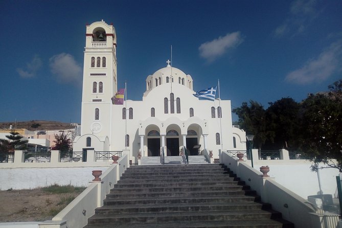Santorini Highlights and Venetian Castles Small-Group Day Tour - Wine in an old canava at Artemis Karamolegos