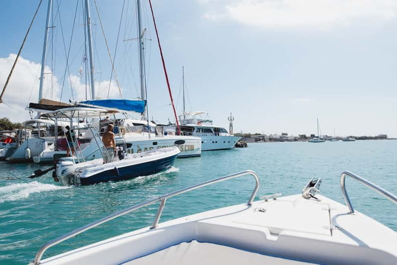 Santorini: License-Free Boat Rental with Ice, Water, & Fruit - What is included aboard the boat