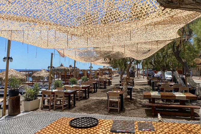 Santorini like a local: Discover local flavors by exploring the island! - Venetsanos Winery above Athinios Port