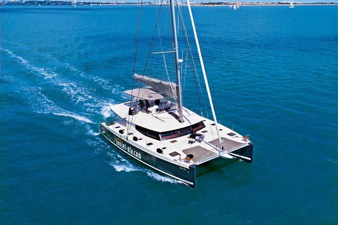 Santorini Luxury Catamaran Day Cruise with BBQ,drinks,transfer - From your hotel to Ammoudi Port at 9:30
