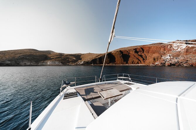 Santorini Luxury Catamaran Private Cruise - Red Beach, White Beach, and the volcanic coast