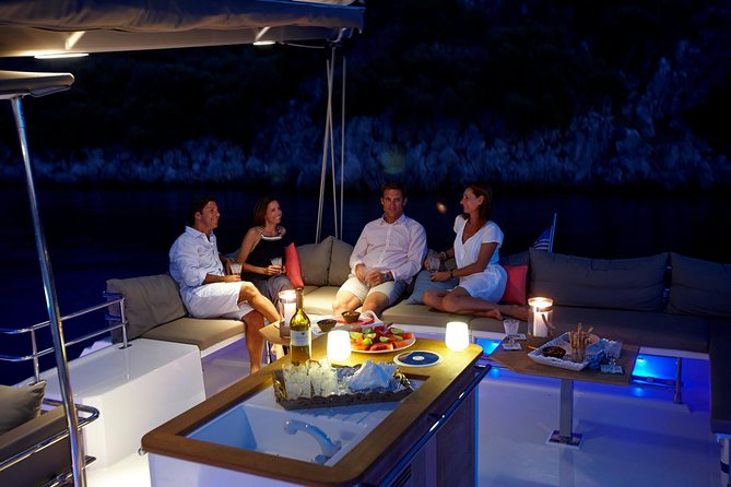Santorini Luxury Catamaran Sunset Cruise with BBQ, Drink and Transfer - Red Beach from the sea