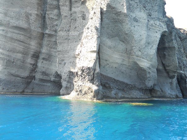 Santorini Luxury Catamaran Sunset Cruise with BBQ, Drink and Transfer - White Beach, barbecue, and a longer swim