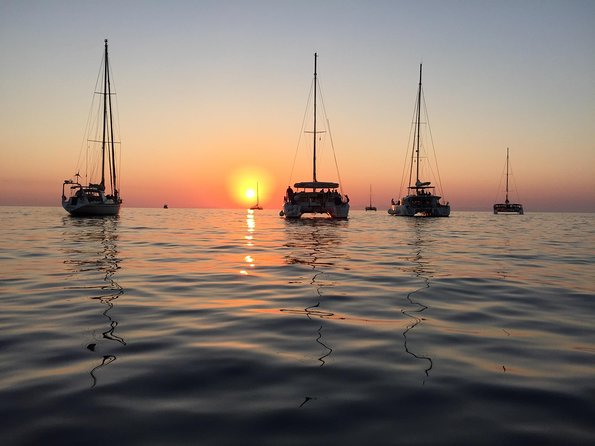 Santorini Luxury Catamaran Sunset Cruise with BBQ, Drink and Transfer - Crew, comfort, and onboard facilities