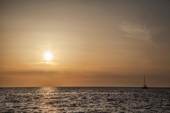 Santorini: Motor Yacht Sunset Cruise with 5-Course Dinner - Timing, weather, and what to bring