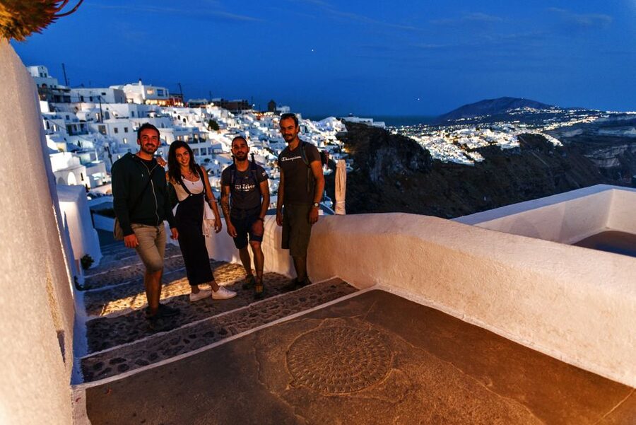 Santorini: Night Hike, Wine Tasting, and Greek Dinner - Seeing Santorini light up after dark