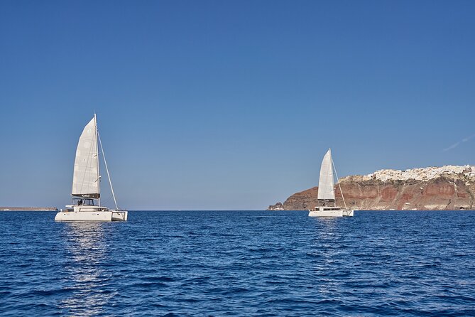 Santorini Oia: Caldera Luxury Day Cruise with BBQ & Drinks - Food, drinks, and service on a small catamaran