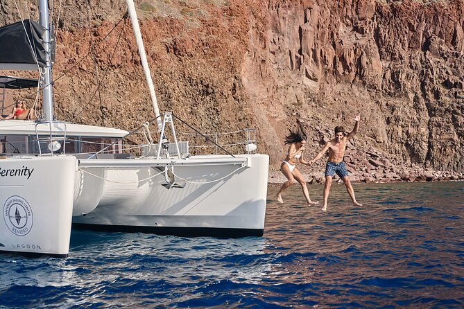 Santorini Oia: Luxury Sunset Cruise with Fresh Fish BBQ & Drinks - Nea Kameni and the sulfur-water stop