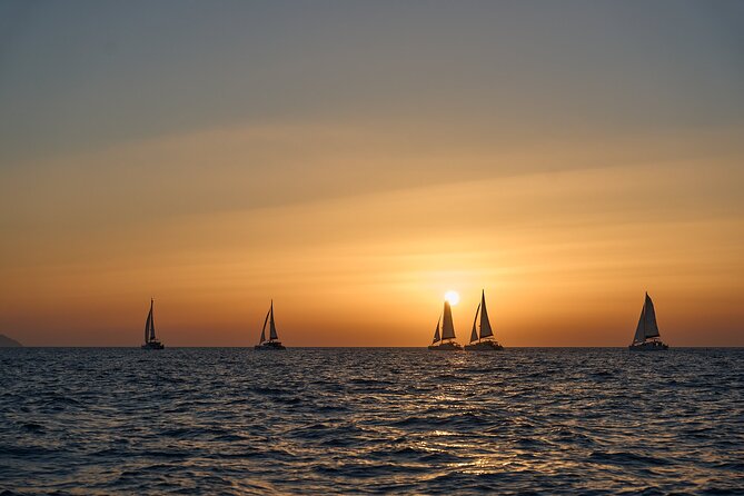 Santorini Oia: Luxury Sunset Cruise with Fresh Fish BBQ & Drinks - Thirassia, a quiet first swim
