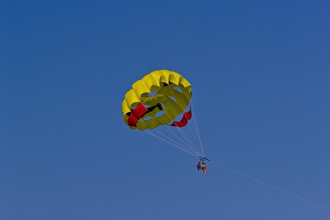 Santorini: Parasailing Flight Experience at Black Beach - Cancellation rules and weather planning