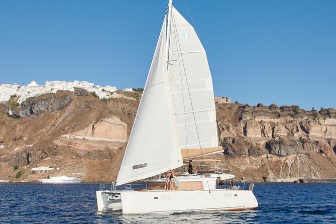 Santorini Platinum Catamaran Cruise with Meal, BBQ and Open Bar - Starting at Vlichada and getting aboard