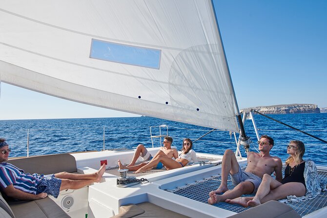 Santorini Platinum Catamaran Cruise with Meal, BBQ and Open Bar - The Akrotiri lighthouse from the deck