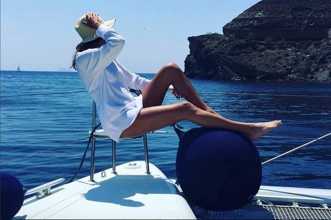 Santorini Platinum Catamaran Cruise with Meal, BBQ and Open Bar - Sunset, music, and the feel of the cruise