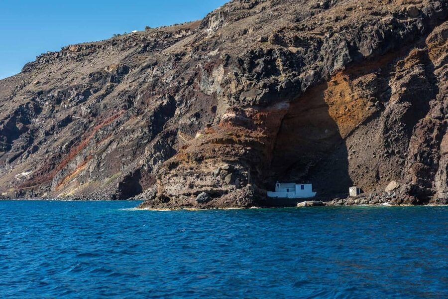 Santorini Port: Cruise to Volcano, Hot Springs & Thirassia - Sailing through Santorini’s caldera