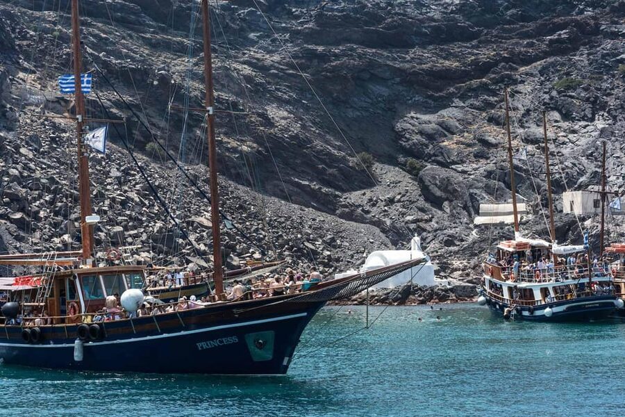 Santorini Port: Cruise to Volcano, Hot Springs & Thirassia - Walking the black rock of Nea Kameni