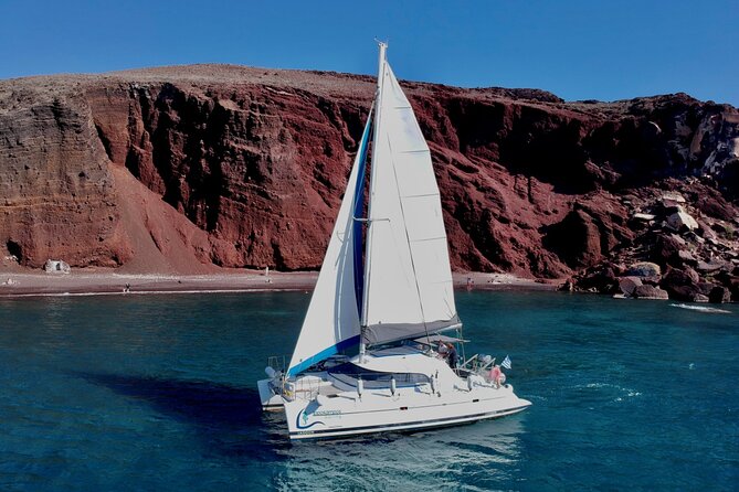 Santorini: Premium Small-Group Catamaran Cruise with Food/Drinks - A full half-day on Santorini’s volcanic coast