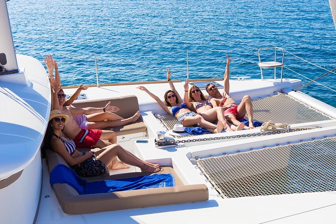 Santorini Private Catamaran Cruise with BBQ, Open Bar & Transfers - Day cruise or sunset sailing?