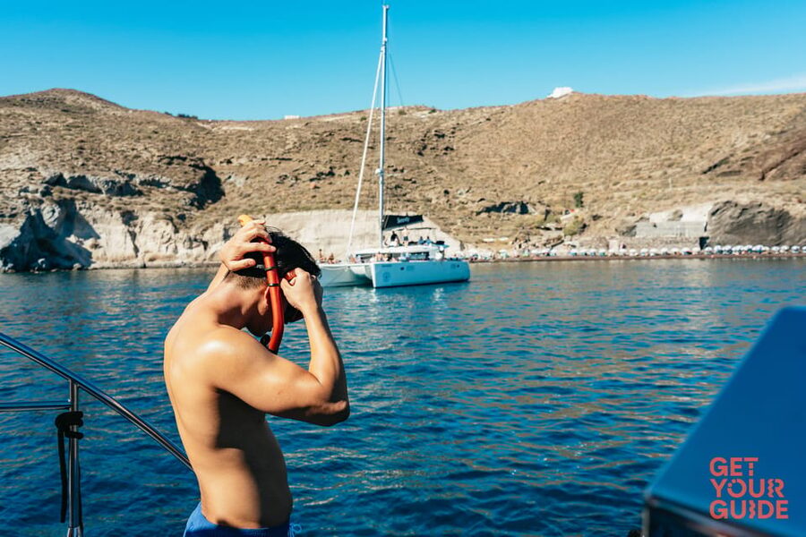 Santorini: Private Catamaran Tour with BBQ Meal and Drinks - Pickup details and the cruise ship warning