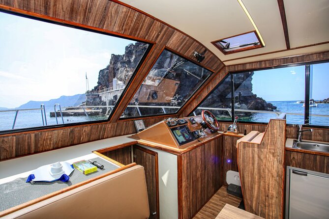Santorini Private Cruise Sightseeing Tour with BBQ and Drinks - Swimming, snorkeling, and a little fishing