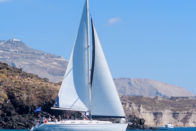 Santorini Private Daytime Sailing Cruise with Meal, Drinks &Transfer included - Swimming near Thirasia