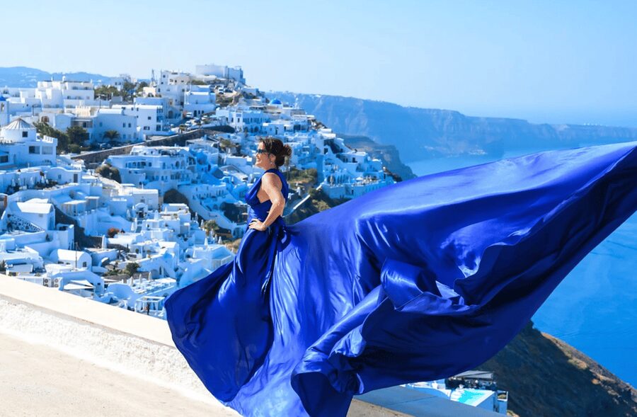 Santorini: Private Flying Dress Photoshoot with Pickup - Weather, cruise schedules, and other limits