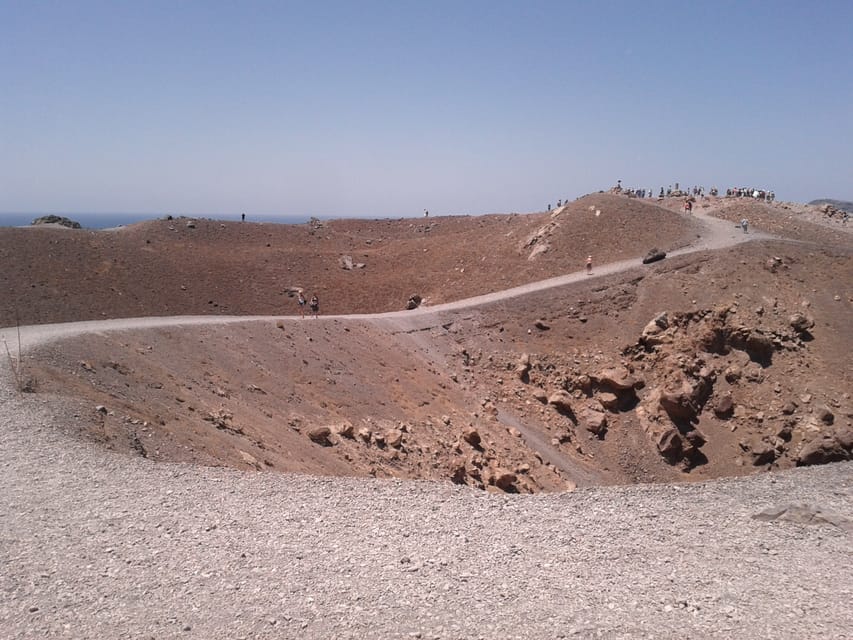 Santorini: Private Motorboat Cruise and Volcano Hike - Leaving Ammoudi and entering the caldera