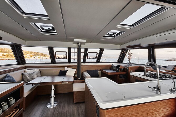 Santorini Private Tour Half-Day Sailing Platinum Catamaran Cruise - Hot Springs and Caldera Bay