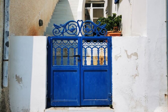 Santorini Private Tour Highlights 6h for Groups and Families - Perissa brings dark sand and calm water