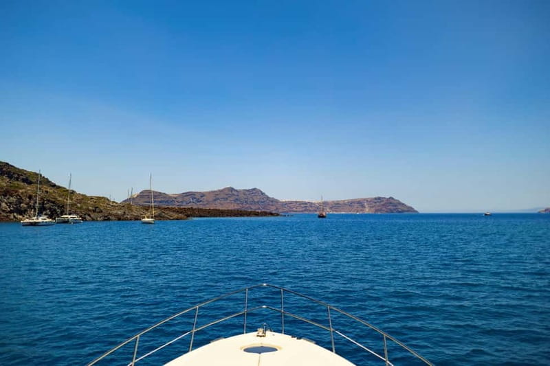 Santorini: Private Yacht Experience of Timeless Elegance - Swimming near the caldera and volcano