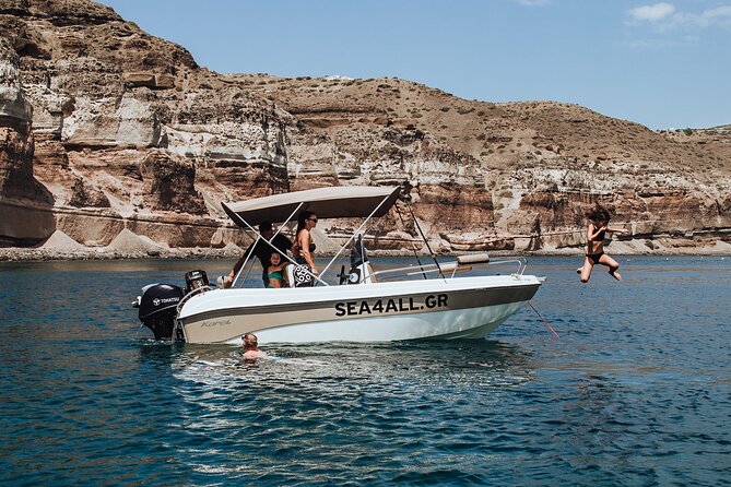 Santorini Rent a Boat Without License - Taking the wheel near Red Beach