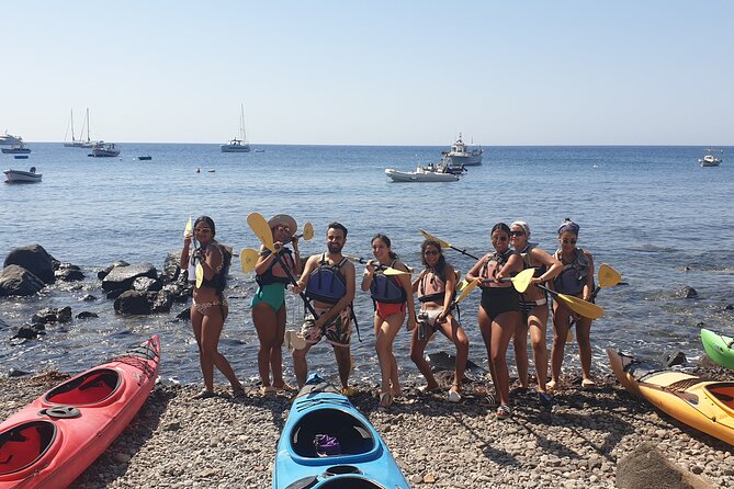 Santorini Sea Kayak - South Discovery, Small Group incl. Sea Caves and picnic - Sea caves, lava rock, and the feeling of open water