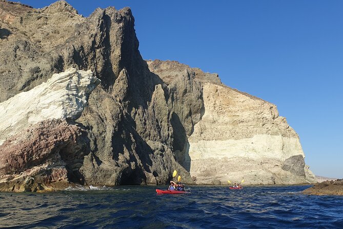 Santorini Sea Kayak - South Discovery, Small Group incl. Sea Caves and picnic - Sunset departures and changing sea conditions