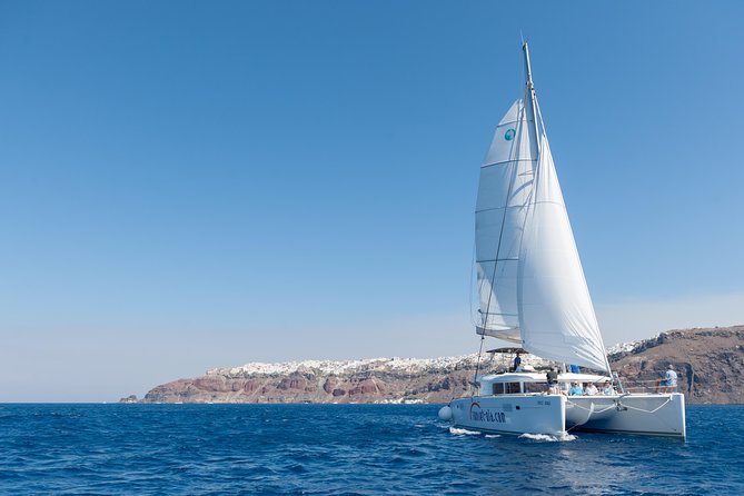 Santorini Small-Group Catamaran Sailing Trip(BBQ,drinks, transfer) - Sailing is not guaranteed